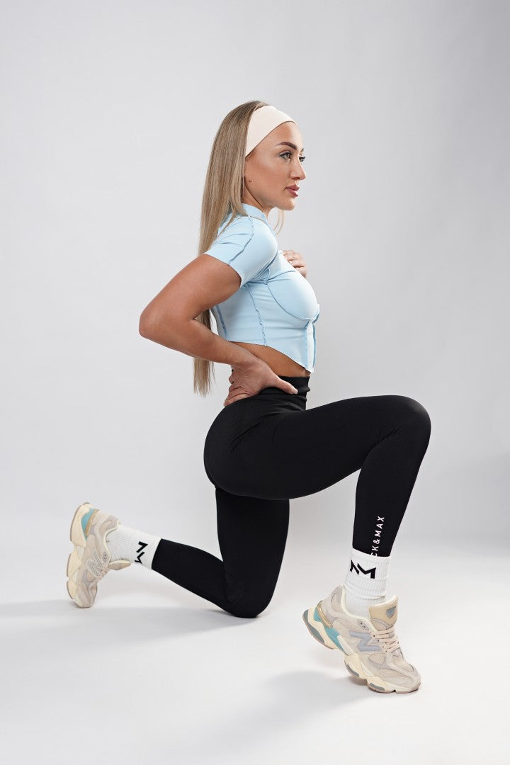 Top Fitness Albastru Deschis Damă – Confort și Stil Activ - NICK&MAX